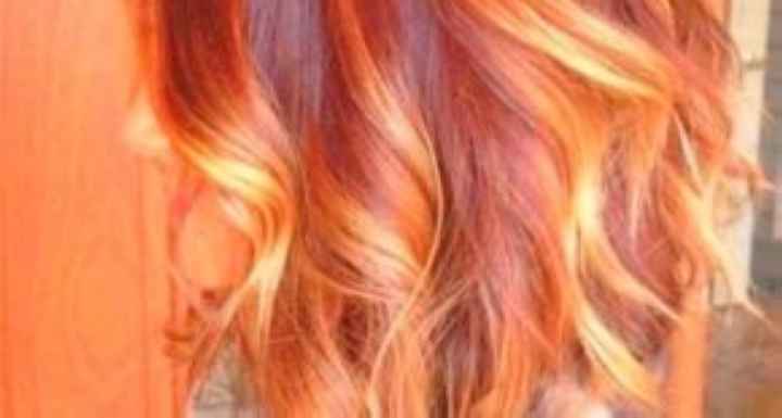 Легкие блики на рыжих волосах